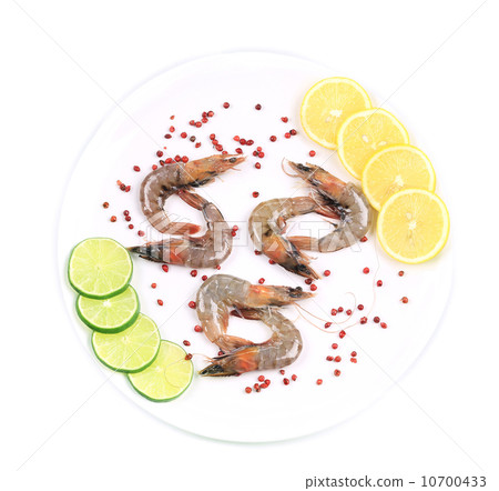 Raw shrimps on plate. Raw shrimps on plate. 10700433