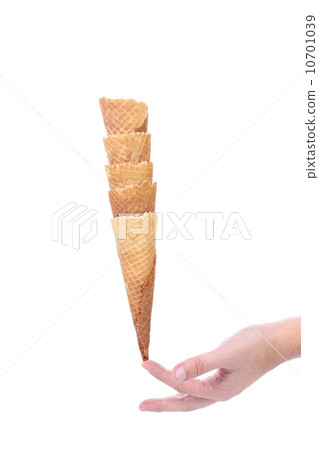 Hand hold stake of wafer cup for ice-cream. Hand hold stake of wafer cup for ice-cream. 10701039