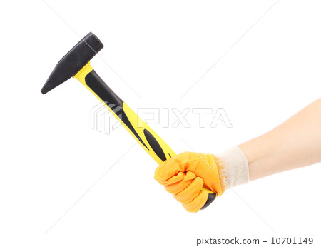 Hand in glove holding hammer. Hand in glove holding hammer. 10701149