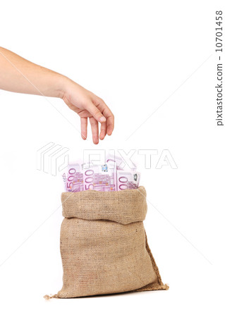 hand take money in the bag hand take money in the bag 10701458