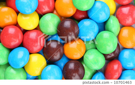 Background of chocolate balls in colorful glaze. 10701463