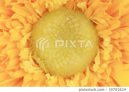 Close up of artificial yellow flower aster. Close up of artificial yellow flower aster. 10701624