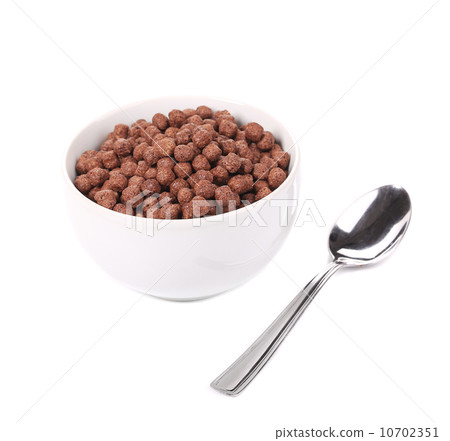 Chocolate cereals in porcelain white bowl. 10702351