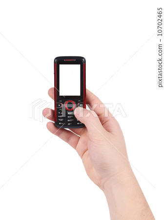 Mobile push-button telephone in hand. 10702465
