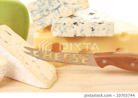 Various types of cheeses on wood. Various types of cheeses on wood. 10703744