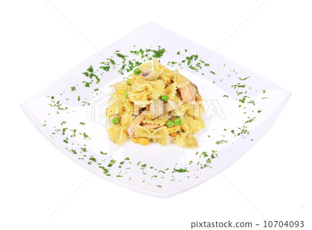 Pasta with ham and mushrooms in sauce pesto. 10704093