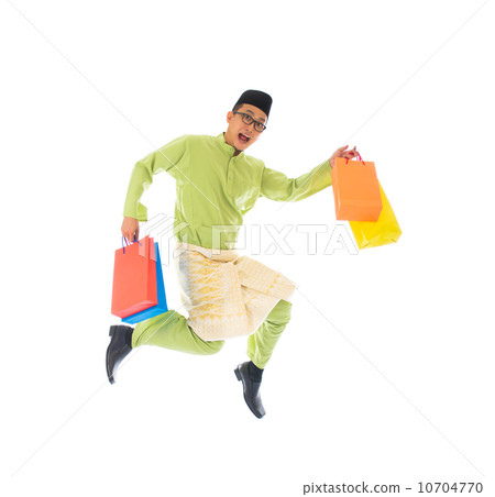 malay male with shopping bags during festival season 10704770