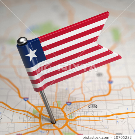 Liberia Small Flag on a Map Background. 10705282
