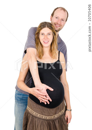 Happy man embracing beautiful pregnant woman isolated Happy man embracing beautiful pregnant woman isolated 10705406