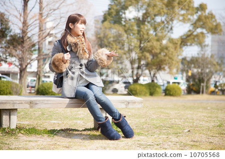 A woman in the park A woman in the park 10705568