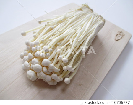 Enoki on cutting board 10706777