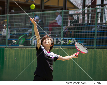 A woman playing tennis 10709619
