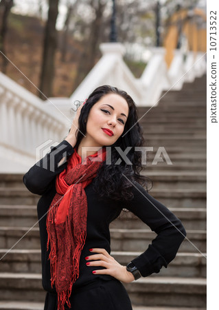 Beautiful Woman in warm autumn day on staircase 10713522