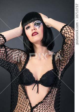 Beautiful woman with fashion makeup 10713737