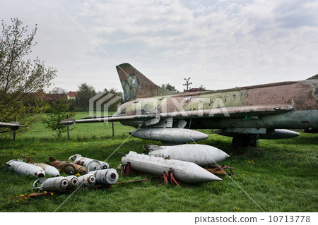Old fighter plane with a variety of bombs Old fighter plane with a variety of bombs 10713778