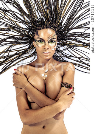 Portrait of a beautiful naked young african american woman with 10715115