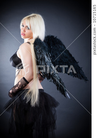 Blond female angel with black wings on a black background 10715165