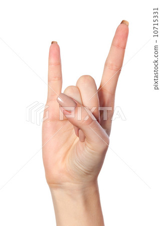 A woman's hand giving the Rock and Roll sign A woman's hand giving the Rock and Roll sign 10715331