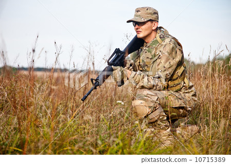 Soldier with a rifle 10715389