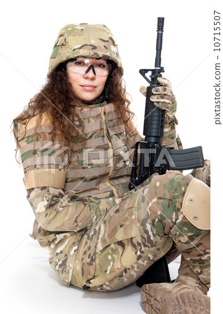 Beautiful army girl with rifle 10715507