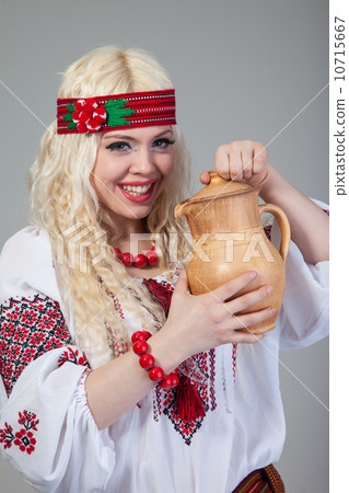 Woman wears Ukrainian national dress Woman wears Ukrainian national dress 10715667