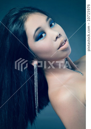 Beautiful brunette Asian woman with long black hair 10715976