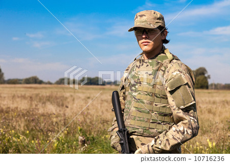 Soldier with a rifle 10716236