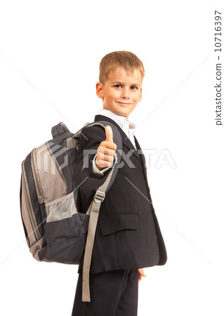 Schoolboy sitting on books Schoolboy sitting on books 10716397