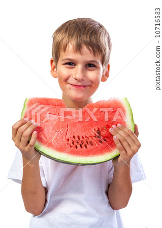 Boy is eating a watermelon Boy is eating a watermelon 10716583