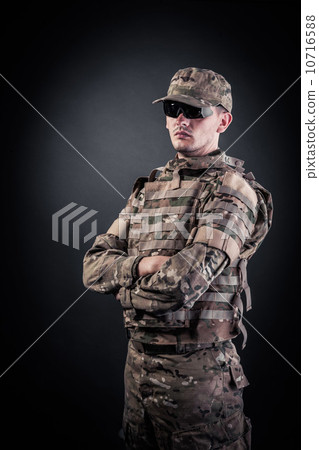 Military man on a black background Military man on a black background 10716588