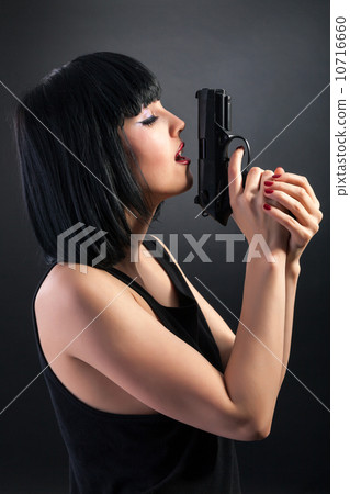 Beautiful woman with face art trying to make suicide Beautiful woman with face art trying to make suicide 10716660