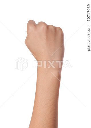 Female hand with a clenched fist isolated Female hand with a clenched fist isolated 10717089