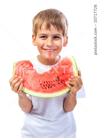 Boy is eating a watermelon 10717726