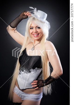 The retro photo of a cute girl in a vintage hat The retro photo of a cute girl in a vintage hat 10717774