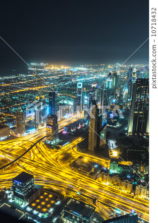 Dubai downtown night scene with city lights, 10718432