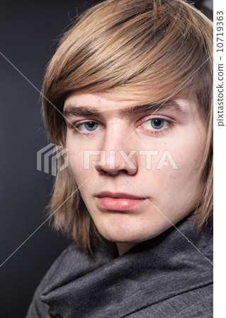 Healthy muscular young man on grey background Healthy muscular young man on grey background 10719363