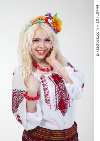 Woman wears Ukrainian national dress 10719444