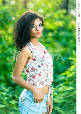 portrait of a beautiful blonde outdoors in the park portrait of a beautiful blonde outdoors in the park 10719533