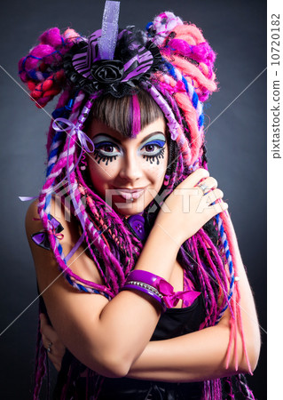Portrait of a woman with multicolored dreadlocks and stylish mak Portrait of a woman with multicolored dreadlocks and stylish mak 10720182