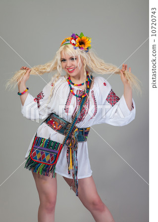 Woman wears Ukrainian national dress Woman wears Ukrainian national dress 10720743