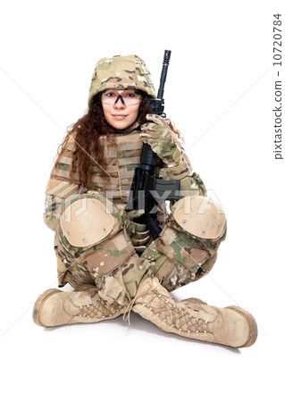Beautiful army girl with rifle 10720784