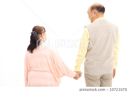 Senior couple behind 10721078