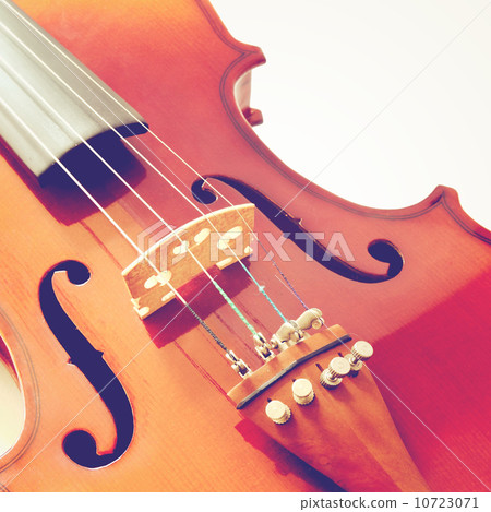 Part of violin with retro filter effect 10723071