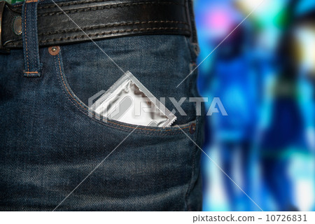 Concept photo of safety sex on date. Condom at the pocket. 10726831