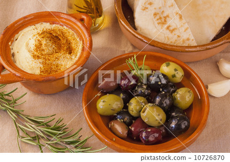Bowl of olives with hummus and pita bread Bowl of olives with hummus and pita bread 10726870
