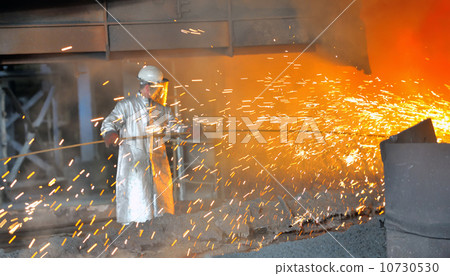 mill worker with hot steel mill worker with hot steel 10730530