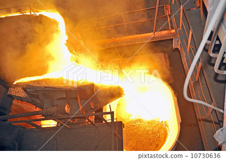pouring molten steel 10730636