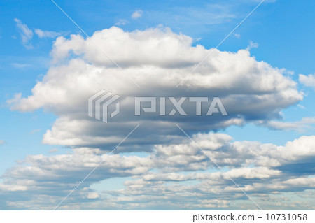 big white and grey clouds in blue sky in spring 10731058