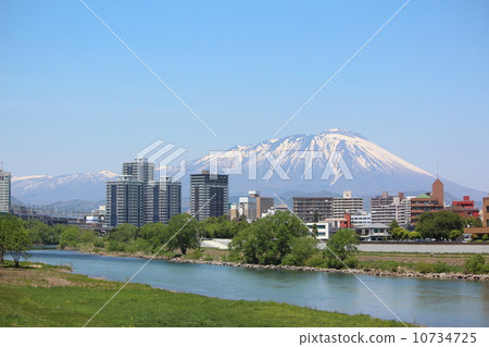Spring Kitakami River and Iwate volley seen from Morioka city, Meiji bridge near 10734725