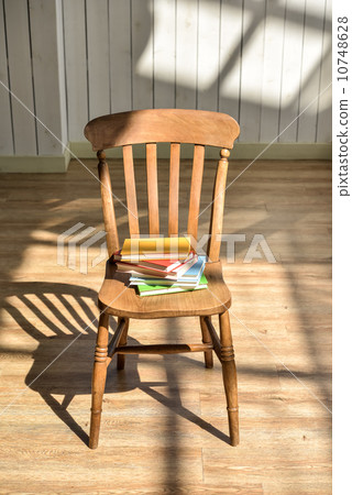 A book on a chair 10748628